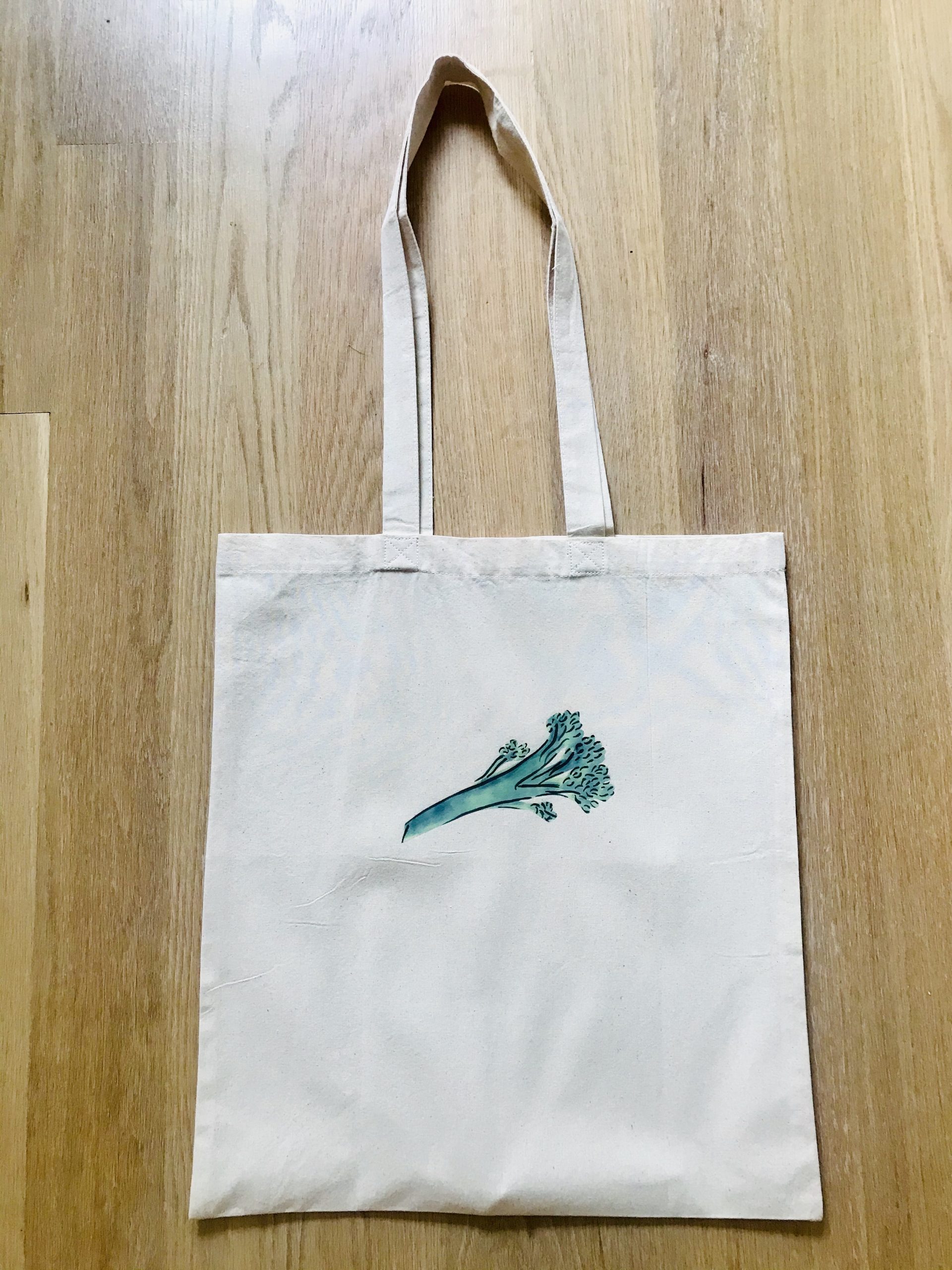 Photo of canvas tote bag with tenderstem broccoli print